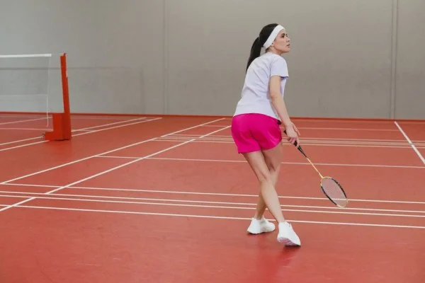 young badminton player